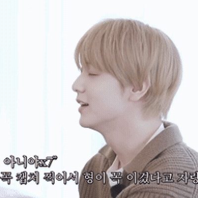 Man With Blonde Hair In Brown Jacket GIF
