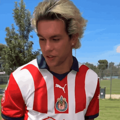 Man With Blonde Hair In Red And White Striped Shirt GIF