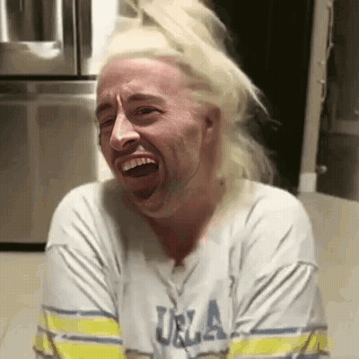 Man With Blonde Hair Making Funny Face GIF