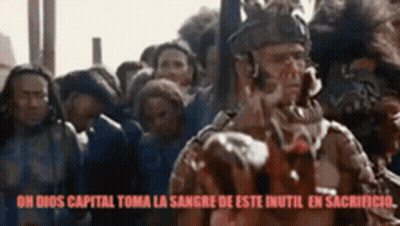 Man With Blood On Chest Before Crowd GIF