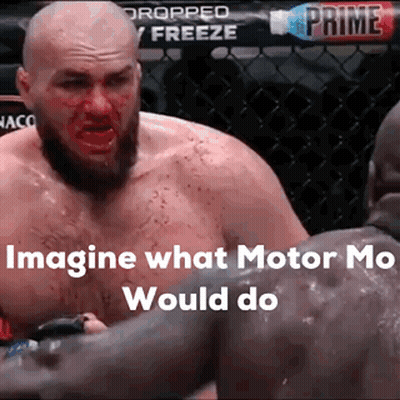 Man With Blood On Face Next To Man In Cage GIF