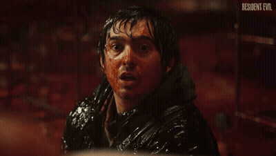 Man With Blood On Face Resident Evil GIF