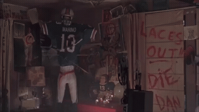 Man With Blood On Face Standing In Front Of Wall Saying Laces Out Die Dan GIF