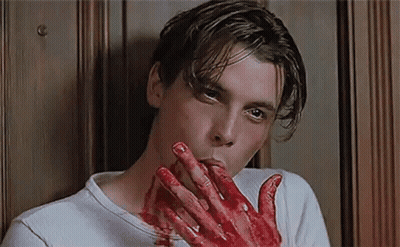 Man With Blood On Hands Biting Nails GIF