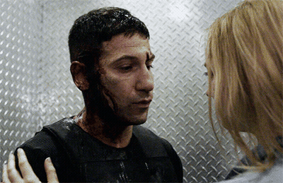 Man With Bloody Face Comforted By Woman GIF