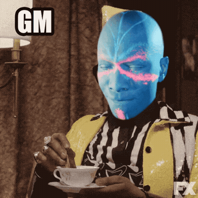 Man With Blue Face Drinking From Cup GIF