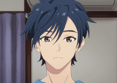 Man With Blue Hair And Brown Eyes Looking At Camera GIF