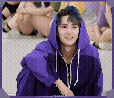 Man With Blue Hair In Purple Hoodie Smiling GIF