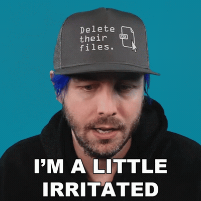 Man With Blue Hair Wearing Delete Their Files Hat GIF