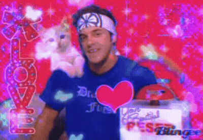 Man With Blue Heart Shirt Holding Stuffed Animal GIF
