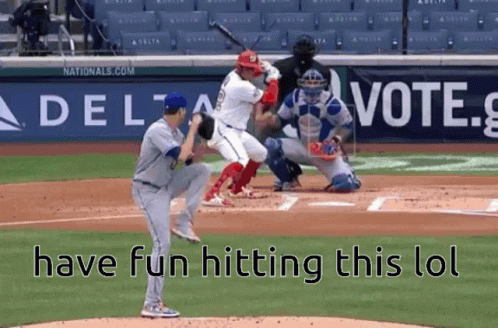 Man With Blue Paint Faces Sword-Wielding Crowd GIF
