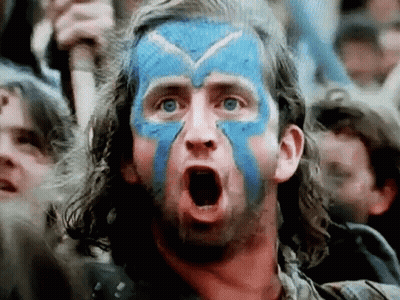 Man With Blue Paint Making Funny Face GIF
