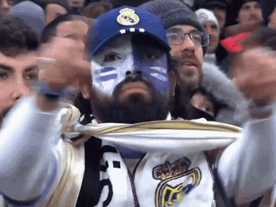 Man With Blue Paint On Face Wearing Real Madrid Cap GIF
