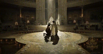 Man With Bow And Arrow In Hut GIF