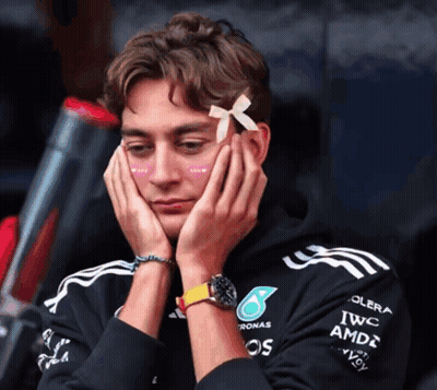 Man With Bow On Forehead Wearing Petronas Hoodie GIF