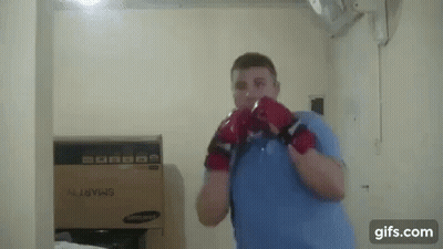 Man With Boxing Gloves And Box GIF