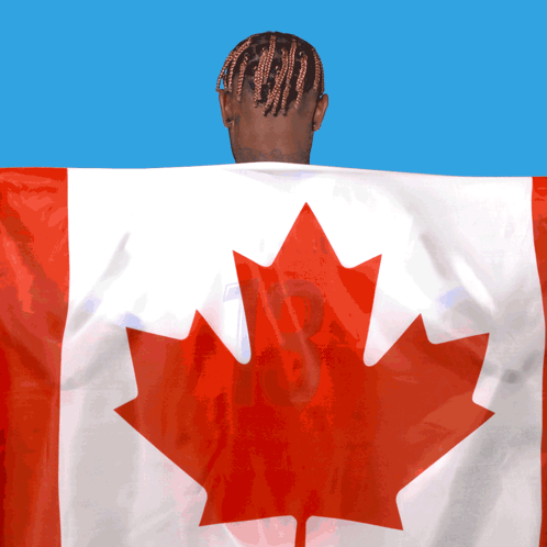 Man With Braided Hair Holding Canadian Flag GIF