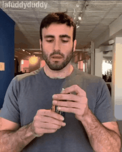 Man With Bread Falling Over GIF