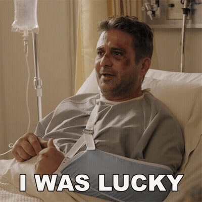 Man With Broken Arm In Hospital Bed Saying I Was Lucky GIF