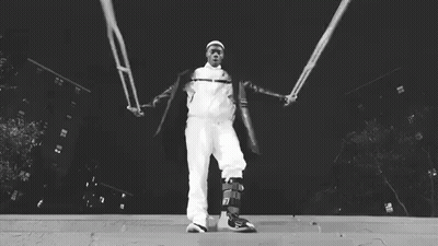 Man With Broken Leg On Staircase With Crutch GIF