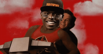 Man With Browns Hat Held By Another Man GIF