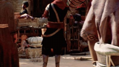 Man With Bucket On Head Standing In Crowd GIF
