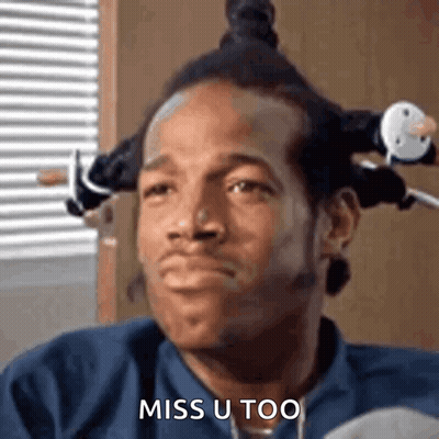 Man With Bun And Pacifier By Window GIF