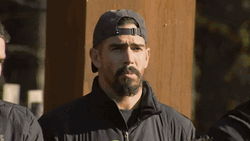 Man With Cap Nodding For The Challenge GIF