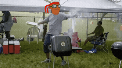Man With Cartoon Character On Head Standing In Front Of Grill GIF