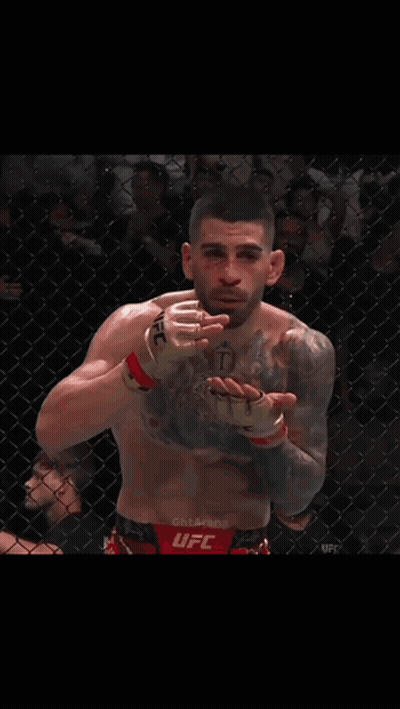 Man With Chest Tattoo And UFC Glove GIF