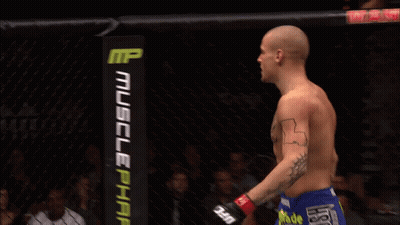 Man With Chest Tattoo In Cage With Dodge Sign GIF