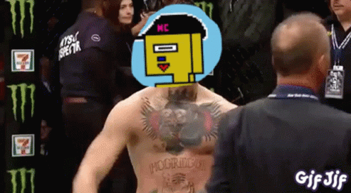 Man With Chest Tattoo In Front Of Monster Energy Sign GIF