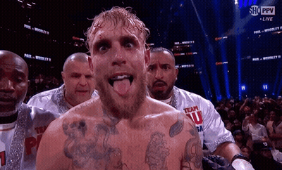 Man With Chest Tattoo Sticking Out Tongue GIF