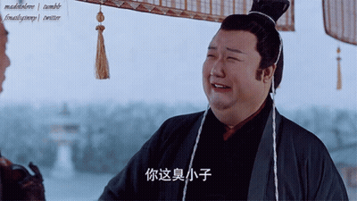 Man With Chinese Writing On Shirt GIF