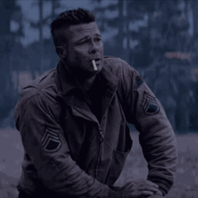Man With Cigarette In Jacket With Letter D On Sleeve GIF