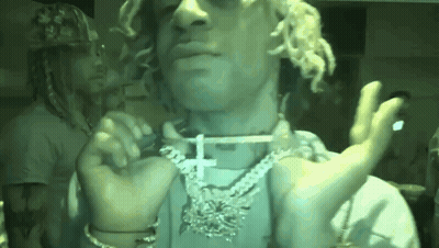 Man With Cross Necklace Holding Cigarette GIF