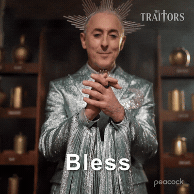 Man With Crown In Silver Suit Saying Bless GIF