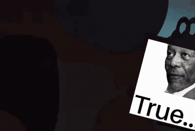 Man With Crown Next To Sign Saying True GIF