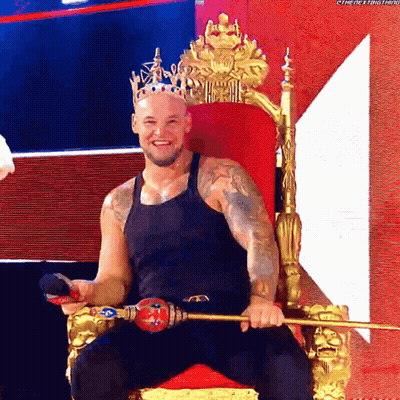 Man With Crown On Throne Holding Sword GIF