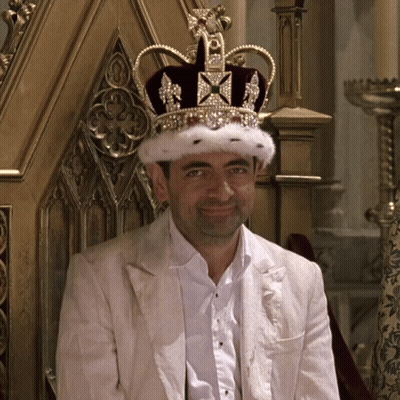 Man With Crown Sitting In Chair GIF