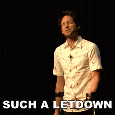 Man With Crutches In Front Of Such A Let Down Sign GIF