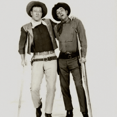 Man With Crutches Next To Man GIF