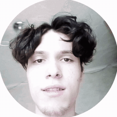 Man With Curly Hair And Beard In Circle GIF