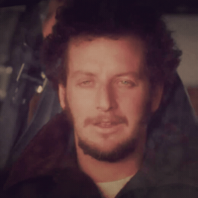 Man With Curly Hair And Beard Smiling GIF