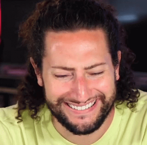 Man With Curly Hair And Beard Smiling GIF