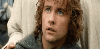 Man With Curly Hair And Blue Eyes Looking Up GIF
