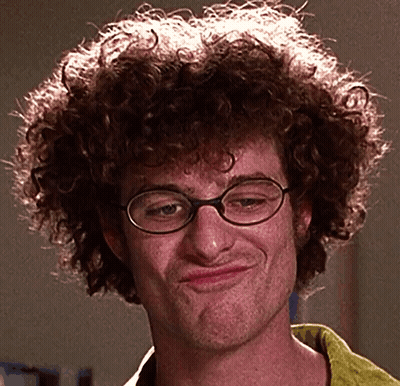 Man With Curly Hair And Glasses Making A Face GIF
