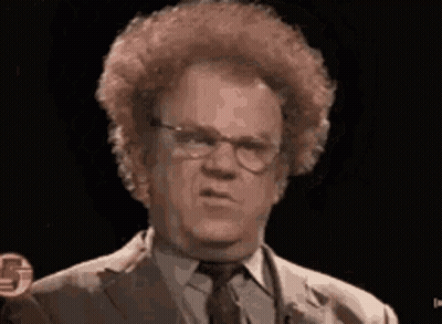 Man With Curly Hair And Glasses Making Funny Face GIF