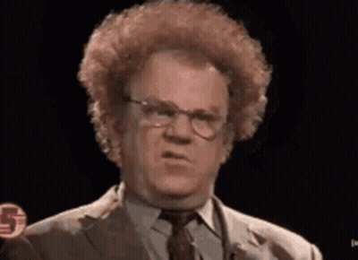 Man With Curly Hair And Glasses Making Funny Face GIF