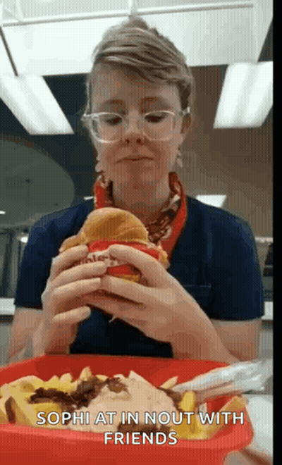 Man With Curly Hair And Pipe Making Funny Face GIF